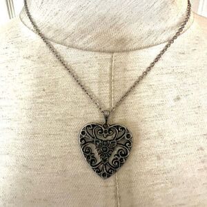 Silver tone heart pendant necklace